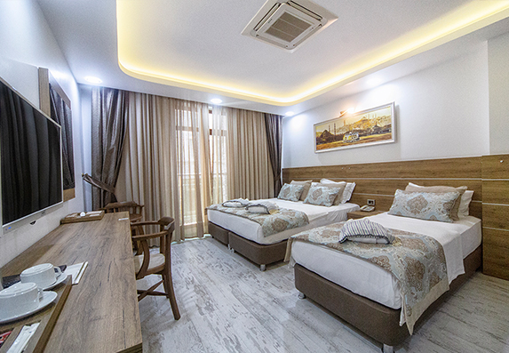 3-kisilik-odalar-2-1-tekli-yatak