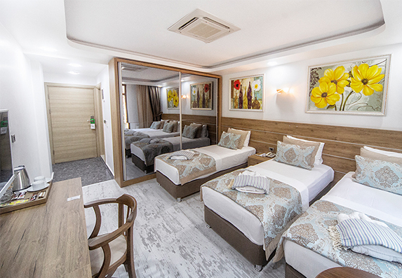 3-kisilik-odalar-3-tekli-yatak